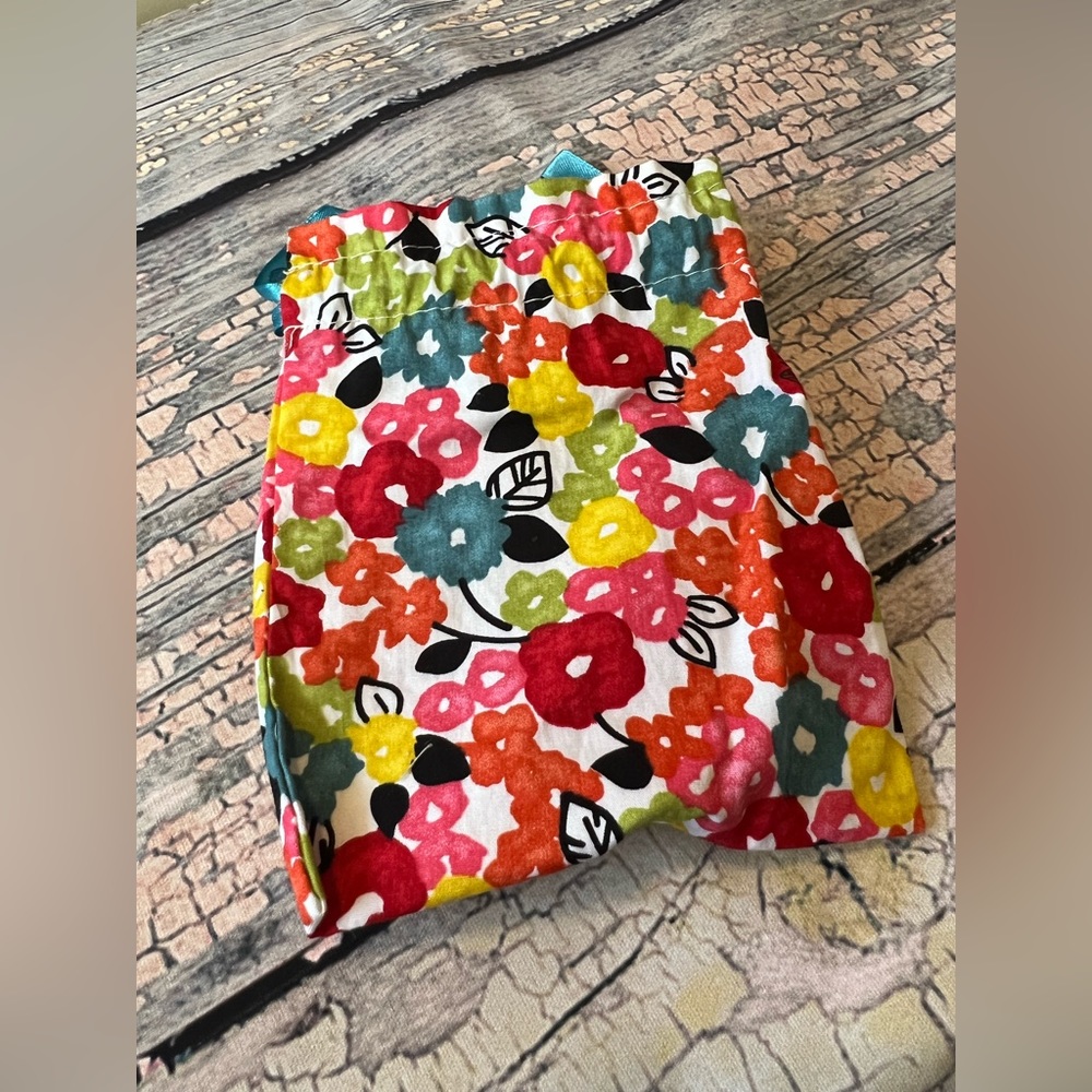 Brighton floral coin bag with ribbon string.